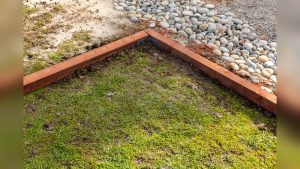 How to Secure Landscape Timbers to Ground That Actually Hold