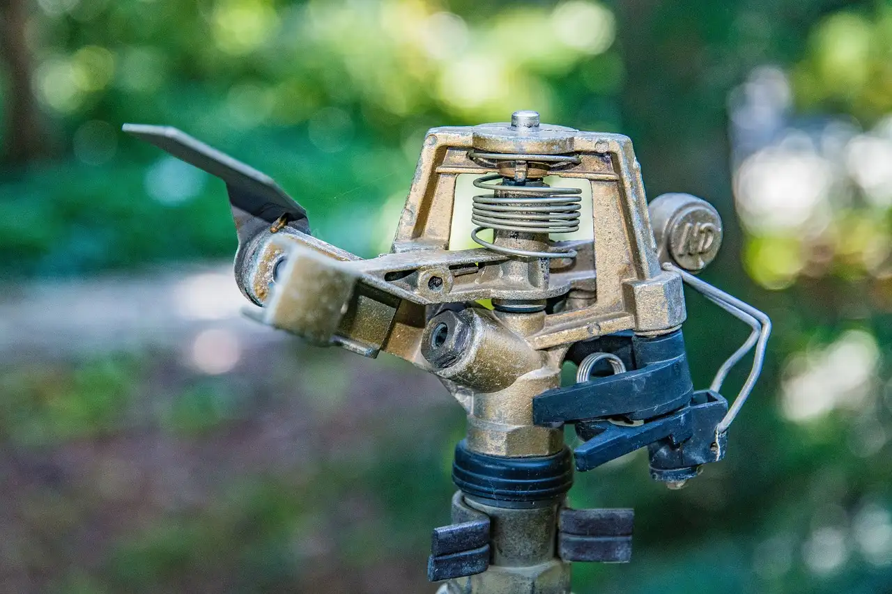 How do I winterize a garden irrigation system before the first freeze?